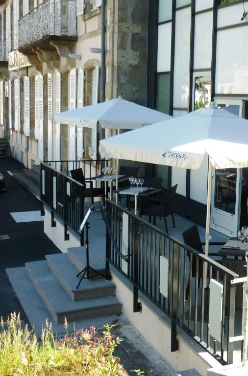 Le Parc Des Fees Hotel Retaurant & Spa La Bourboule Bagian luar foto
